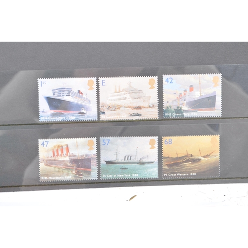 468 - A large collection of loose unhinged 20th and 21st century British Royal Mail postage stamps. The ma... 