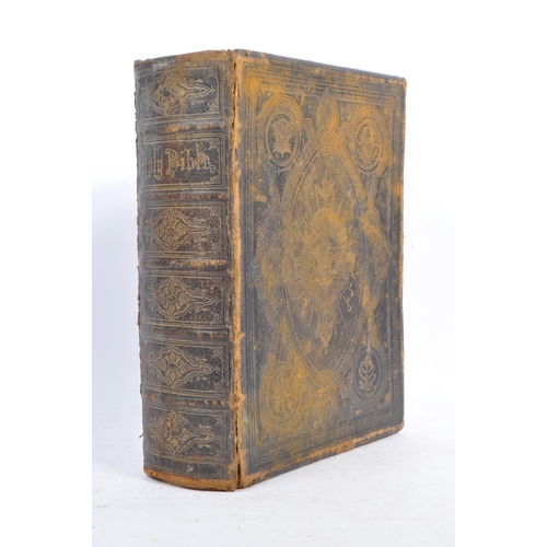 479 - A Victorian 19th century Brown's Self-Interpreting Family Bible in embossed leather bound cover. The... 