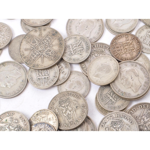 486 - A collection of 20th century pre 1947 British sixpence and shilling coins. The majority dating to 19... 