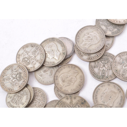 486 - A collection of 20th century pre 1947 British sixpence and shilling coins. The majority dating to 19... 