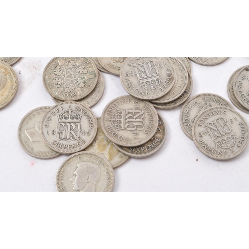 488 - A collection of 20th century pre 1947 British sixpence and shilling coins. The majority dating to 19... 