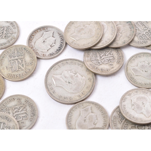 488 - A collection of 20th century pre 1947 British sixpence and shilling coins. The majority dating to 19... 