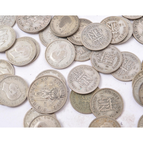 488 - A collection of 20th century pre 1947 British sixpence and shilling coins. The majority dating to 19... 