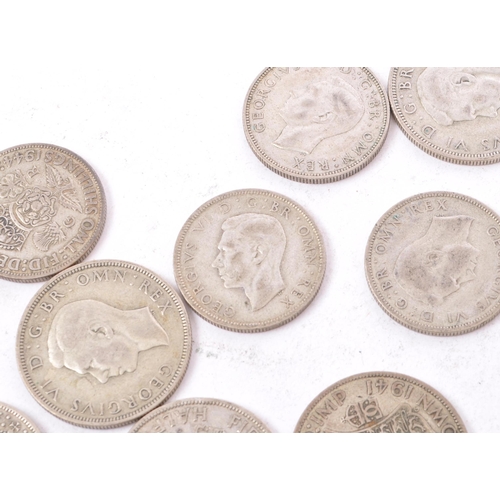 490 - A collection of 20th century British 1940s half crowns and two shilling coins. Total weight 450g.