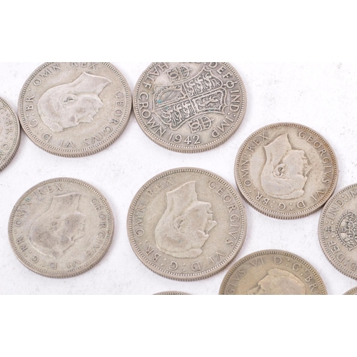 490 - A collection of 20th century British 1940s half crowns and two shilling coins. Total weight 450g.