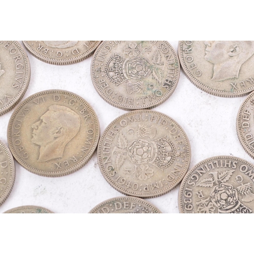 490 - A collection of 20th century British 1940s half crowns and two shilling coins. Total weight 450g.