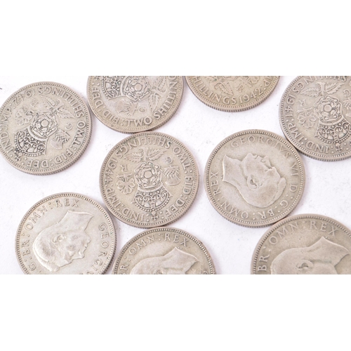 492 - A collection of 20th century 1922-1947 British half crowns and two shillings. Total Weight 354g.