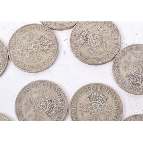 492 - A collection of 20th century 1922-1947 British half crowns and two shillings. Total Weight 354g.