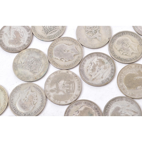 496 - A collection of 20th century circa 1922-1947 British shilling coins.Total weight 357g.