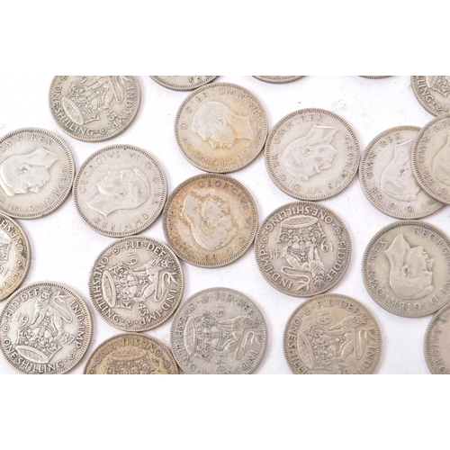 497 - A collection of 20th century 1922-1947 British shilling coins. Total Weight 322g.