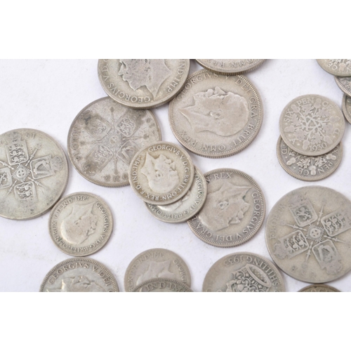 498 - A collection of 20th century circa. 1922-1947 British coins to include sixpence, florins and shillin... 