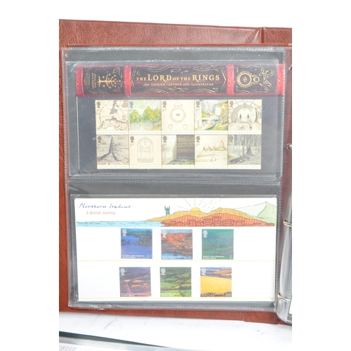 500 - A collection of 21st century British presentation pack commemorative stamps and Royal Mail post and ... 