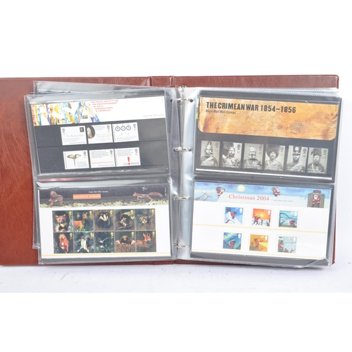 500 - A collection of 21st century British presentation pack commemorative stamps and Royal Mail post and ... 