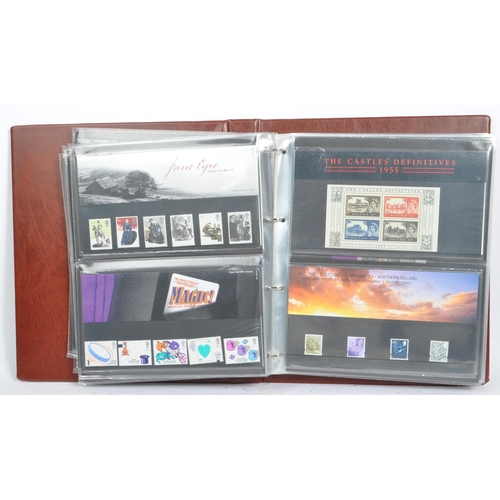 500 - A collection of 21st century British presentation pack commemorative stamps and Royal Mail post and ... 