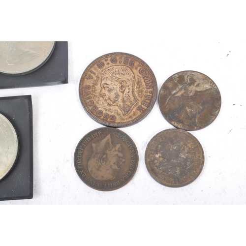 503 - A collection of United Kingdom and foreign commemorative crowns & assorted coins. The lot to include... 