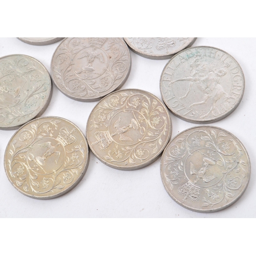 521 - A collection of 20th century British currency 'Crowns' coinage. The collection to include; 2 x Sir W... 