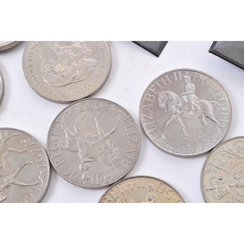 521 - A collection of 20th century British currency 'Crowns' coinage. The collection to include; 2 x Sir W... 