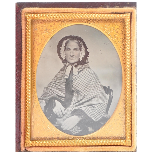 524 - A 19th century Victorian daguerreotype photograph to depict an elderly woman wearing a bonnet and pl... 