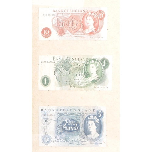 526 - A framed and glazed collection of early and mid 20th century British bank notes. The collection to i... 