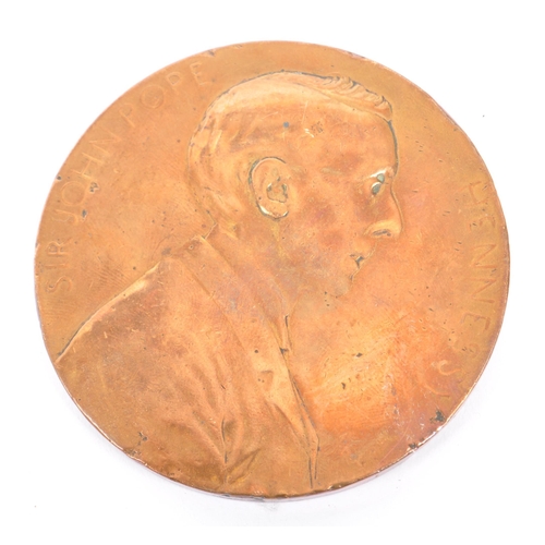 540 - A late 19th century circa 1890 Mauritian Sir John Pope Hennessy commemorative bronze medal, alongsid... 