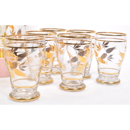 59 - A large collection of mid 20th century glassware / lemonade sets. The glassware all being of clear g... 