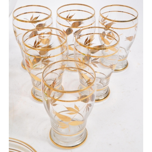 59 - A large collection of mid 20th century glassware / lemonade sets. The glassware all being of clear g... 