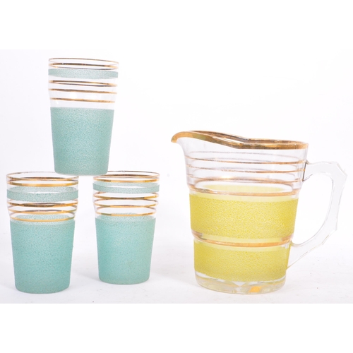 59 - A large collection of mid 20th century glassware / lemonade sets. The glassware all being of clear g... 