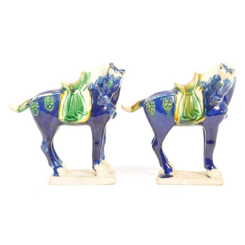 60 - Two ceramic later 20th century Chinese reproduction Tang dynasty style ceramic glazed war horse figu... 