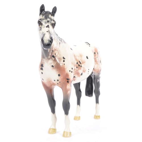 68 - Beswick - Appaloosa stallion - model No. 1772, black, white and mottled brown. Measures approx. 20cm... 