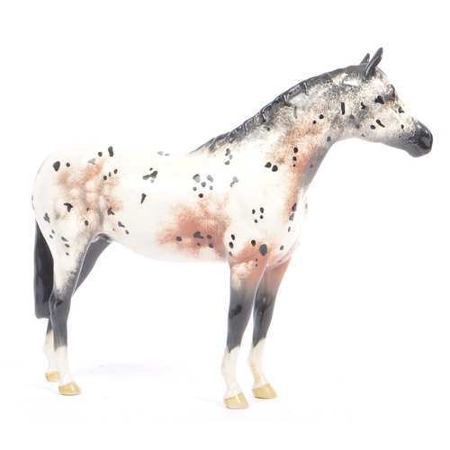 68 - Beswick - Appaloosa stallion - model No. 1772, black, white and mottled brown. Measures approx. 20cm... 