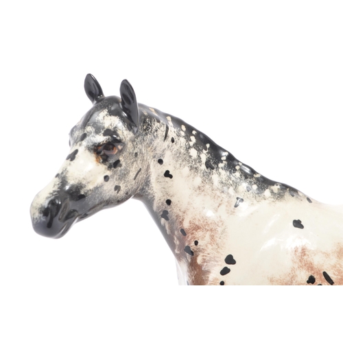 68 - Beswick - Appaloosa stallion - model No. 1772, black, white and mottled brown. Measures approx. 20cm... 