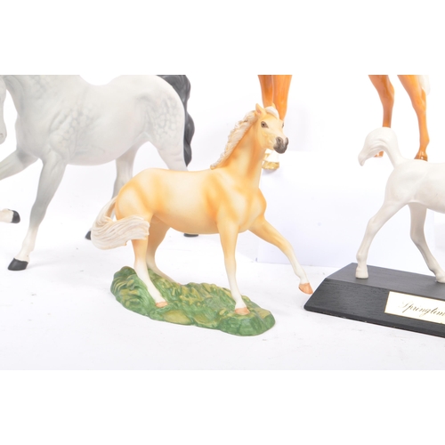 69 - Beswick - Three porcelain china horses Huntsman's Palomino, another example matt grey no. 1549 and b... 