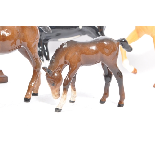 72 - Beswick - A collection of four porcelain china horse figurines. Comprising of a Black Hackney Horse ... 