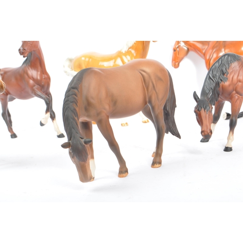 73 - Beswick - A collection of five porcelain china display horses. Comprising of palomino swing tail hor... 