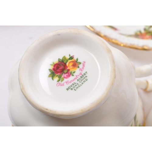 77 - Royal Albert - A large mid 20th century circa 1960s ceramic tea service set. In the Old Country Rose... 