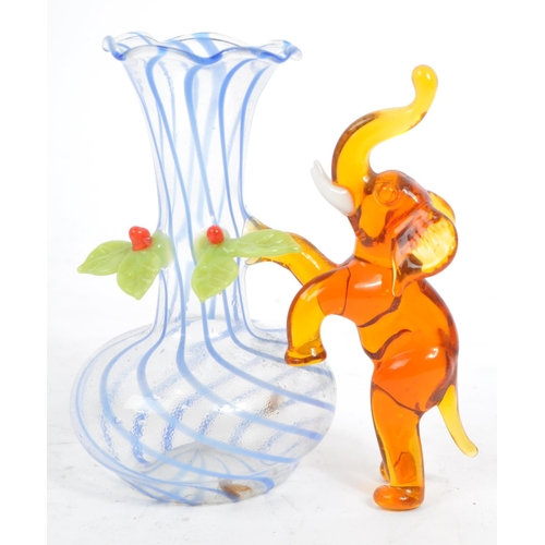 83 - A collection nine vintage late 20th century circa 1970s Murano glass figurines. Comprising of an ele... 