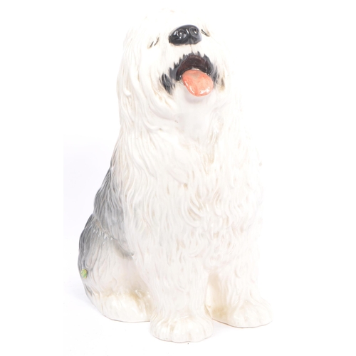 84 - Two mid century vintage 20th century ceramic porcelain old English sheepdogs by Beswick. Consisting ... 