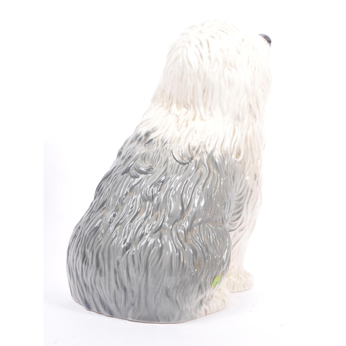 84 - Two mid century vintage 20th century ceramic porcelain old English sheepdogs by Beswick. Consisting ... 