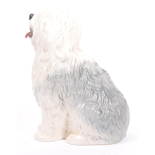 84 - Two mid century vintage 20th century ceramic porcelain old English sheepdogs by Beswick. Consisting ... 