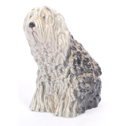 84 - Two mid century vintage 20th century ceramic porcelain old English sheepdogs by Beswick. Consisting ... 