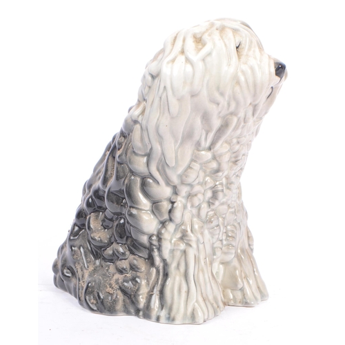 84 - Two mid century vintage 20th century ceramic porcelain old English sheepdogs by Beswick. Consisting ... 