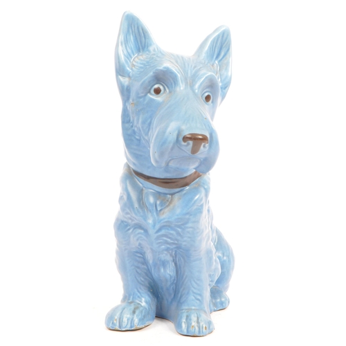 86 - Sylvac - A large fine bone china & ceramic seated dog animal figurines. In a blue colourway and mark... 