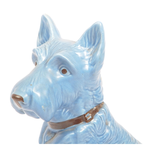 86 - Sylvac - A large fine bone china & ceramic seated dog animal figurines. In a blue colourway and mark... 