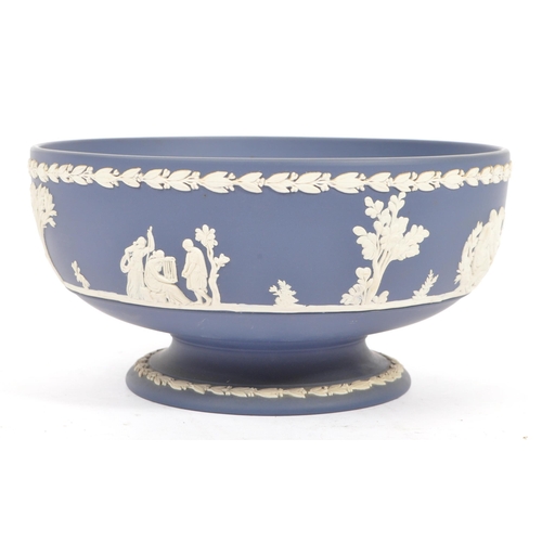 87 - An early 20th Century English antique ceramic Pedestal bowl by Josiah Wedgwood & Sons. Having blue a... 