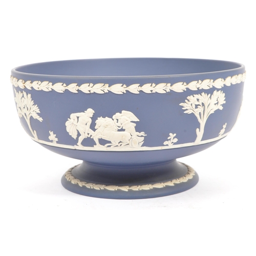 87 - An early 20th Century English antique ceramic Pedestal bowl by Josiah Wedgwood & Sons. Having blue a... 