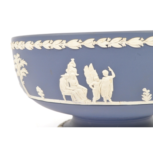 87 - An early 20th Century English antique ceramic Pedestal bowl by Josiah Wedgwood & Sons. Having blue a... 