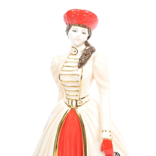 88 - Coalport - A contemporary porcelain china table female figurine. Merry Christmas 2012, made in a lim... 