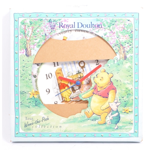 97 - Disney - A retro 1980's Royal Doulton ceramic Winnie the Pooh wall clock & two ceramic plates. From ... 