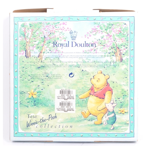 97 - Disney - A retro 1980's Royal Doulton ceramic Winnie the Pooh wall clock & two ceramic plates. From ... 