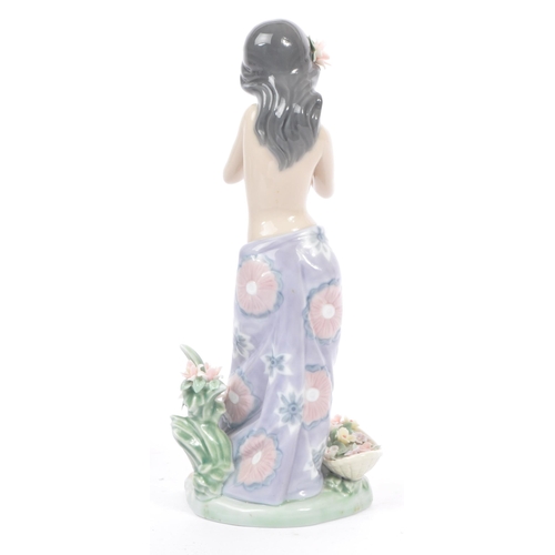 99 - Lladro - Aroma of the Island - A vintage 20th century porcelain china. Measures approx. 24cm tall .